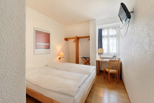 Economy Doppelzimmer mit Dusche/WC/Queensize-Bett